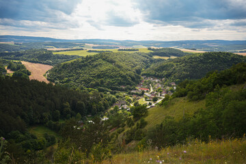 Fototapeta premium Summer Mountain View Overlooking Village in the Valley
