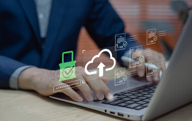 Concept of secure cloud storage data backup and privacy protection. Businessman uploading and...