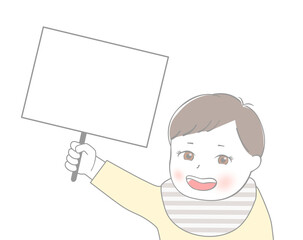 プラカードを持っている赤ちゃん