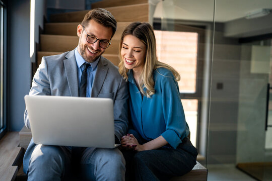 Team of programmers writing digital code in the metaverse and working together on the internet