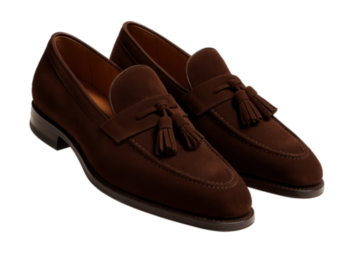 Brown suede loafers featuring tassel accents and an almond-shaped toe.