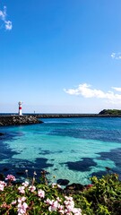 Coastal lighthouse with turquoise water