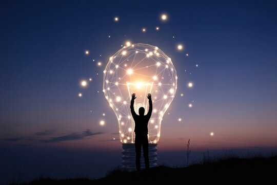 Person celebrating an idea with a luminous lightbulb network