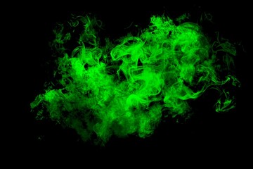Green smoke on black background