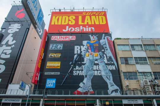 Joshin Super Kids Land Main Store with Gundam commerical on Sakai suji Avenue at Nipponbashi 4 in Nipponbashi District, Naniwa ward, city of Osaka, Japan.