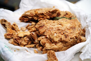 Pork cracklings dish: a traditional Italian peasant product, made from pork fat during the preparation of lard