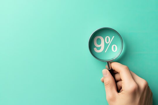 Hand holding magnifying glass with 9% displayed