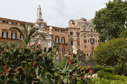 Palazzo dei Normanni and Teatro Marmoreo statue on Piazza del Parlamento in Palermo city on Sicily island. Italy. Europe.