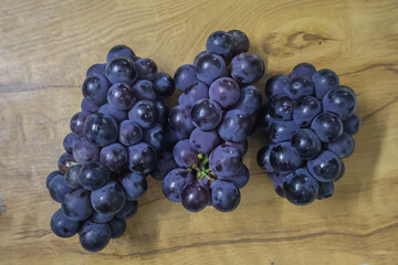 Bunch of dark blue grapes. Fresh Concord grapes, Healthy fruits.