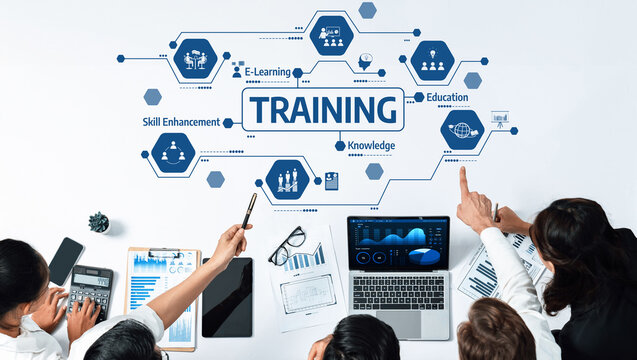 A dynamic training session showcasing e-learning methods and skill enhancement strategies, emphasizing teamwork and effective knowledge sharing in a modern workplace setting. Amity