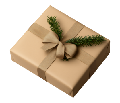 Christmas gift wrapped in brown craft paper decorated with spruce branch.