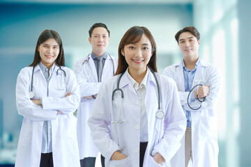 Medicine and healthcare concept : Group of happy and cheerful Asian doctors, Male and Female are smiling in Operating Room.
