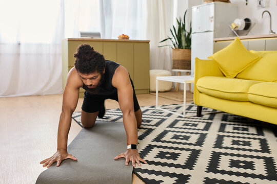 Focused workout session by an athletic man at home in modern living space