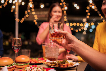 bartender pouring beer into glass