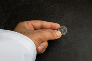 photo of Omani banknote displaying the intricate design and cultural elements of the Omani Rial.