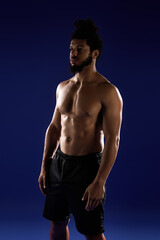 Fototapeta premium Athletic man shows strength and determination during a workout session