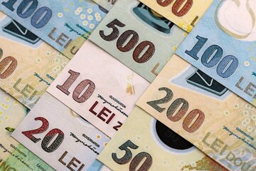 Romanian Leu currency money bills. RON currency banknotes in stack with different denomination...