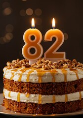 Celebratory cake with number candles for eighty second birthday occasion