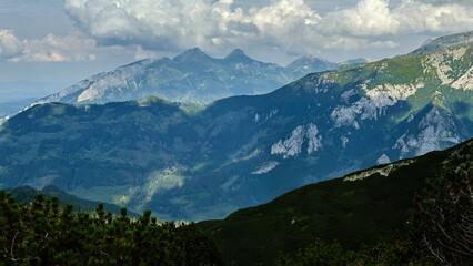 Fototapeta premium Majestic alpine landscape in Zakopane Poland with green hills and distant mountains