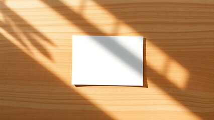 notecard. Minimalist wooden desk with a single blank notecard casting natural shadows, embodying simplicity. tutorial guides, club newsletters, designed for tourism and weekend activity guides.