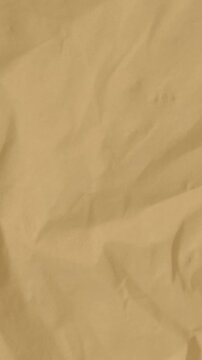 animation of brown paper crumpled motion video background, paper crumpled vertical motion video.