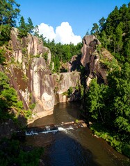 Rocky river gorge under a blue sky