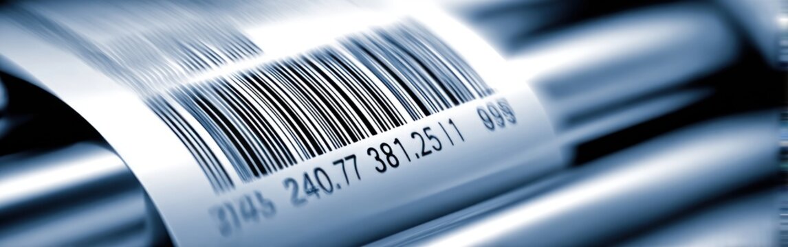 Focus on a barcode printed on a shiny metallic surface, highlighting the details and reflections in daylight