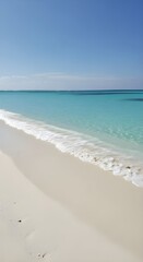 A serene tropical beach with crystal clear water and white sand shore