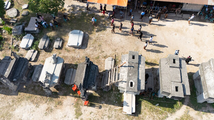 Megalithic graves made of large stones in Umabara Pau village,east sumba, seen from the air
