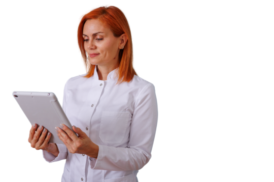 Doctor or nurse woman using digital tablet, researching medical information, working in healthcare technology