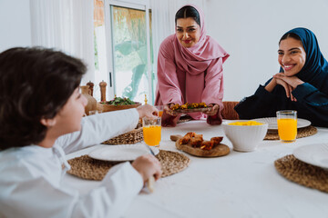 Emirati muslim family dining together during ramadan