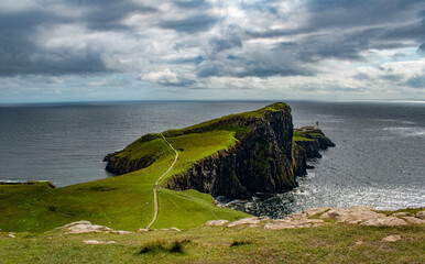Scotland, Uk: aerial view of the sheer cliff of Neist Point lighthouse (1909), famous promontory and viewpoint on the most westerly point on the Duirinish peninsula on the Isle of Skye
