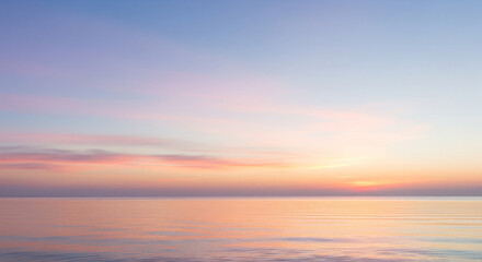 Fototapeta premium Soft, Pastel Gradient Sunset or Sunrise Over Calm Ocean Horizon A beautifully serene and minimalist landscape photo capturing the gentle transition of colors during either sunset or sunrise over 