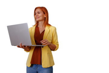 Redhead businesswoman smiling, holding a laptop, engaged in online work or communication. Transparent background