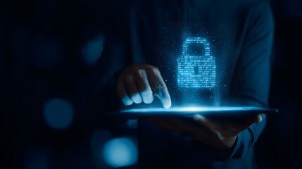 Person interacts with digital padlock icon projected from a tablet device in a dark setting