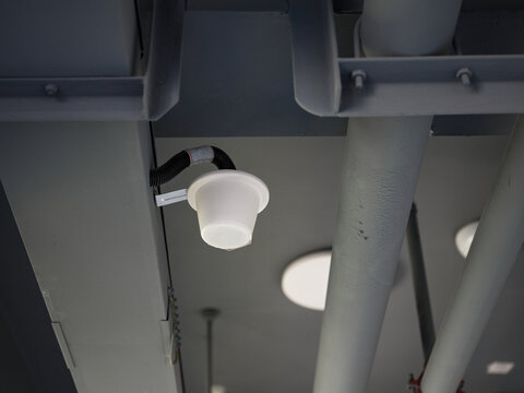 Distributed wireless communication antennas on the ceiling