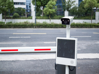 Parking barrier with security camera and screen