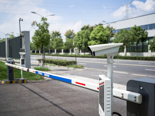 Parking barrier with security camera and screen