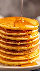 Stack of pancakes with syrup