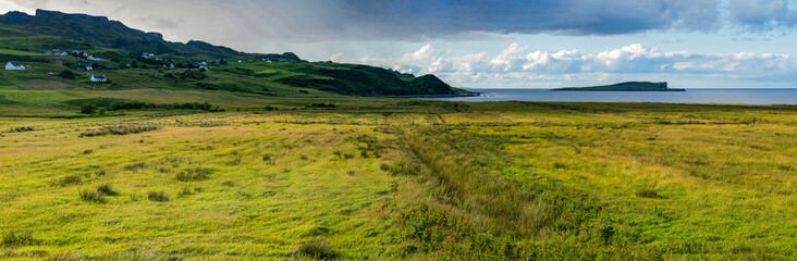 Isle of Skye, Scotland, Uk: aerial and panoramic view of the northeastern coast, with view of the small island Eilean Flodigarry in front of the township of Flodigarry, Trotternish Peninsula

