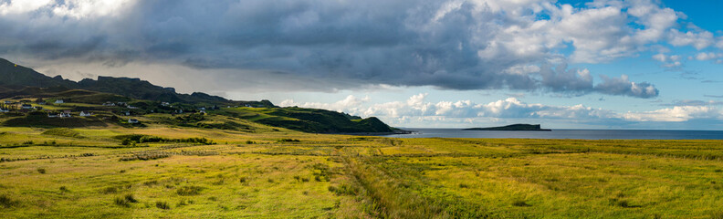 Isle of Skye, Scotland, Uk: aerial and panoramic view of the northeastern coast, with view of the small island Eilean Flodigarry in front of the township of Flodigarry, Trotternish Peninsula
