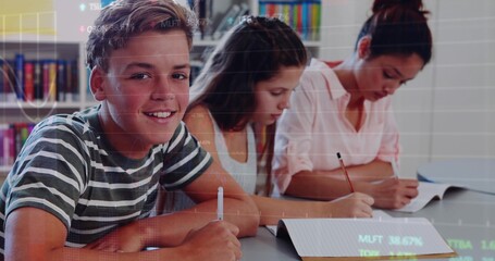 Three students writing in notebooks at library table, with digital overlay and bookshelf © vectorfusionart
