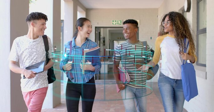 Walking four teenage students holding tablet through school corridor, with holographic data overlay