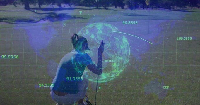 Crouching golfer holding putter aligning ball near hole on putting green, overlaying grid hologram