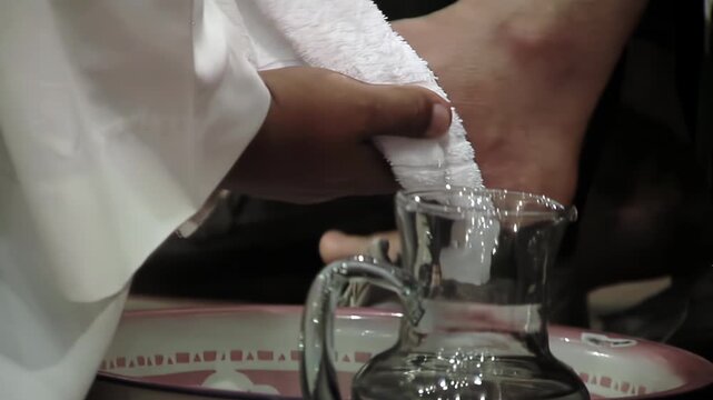 Catholic Holy Thursday Ritual, Priest Washing the Feet of Believer - 4K