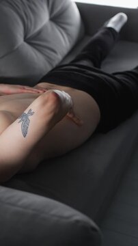 Lower back strain.
A man suffers from back pain.
Spinal injury.
A man massages his sore back and experiences severe pain.
Hernia, injury, pain, discomfort, massage