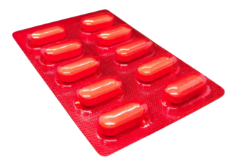 pills and red capsules close up Tablets, pill pack