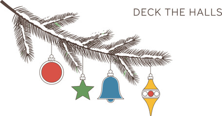 Holiday ornaments hanging from a snow covered pine branch for christmas time