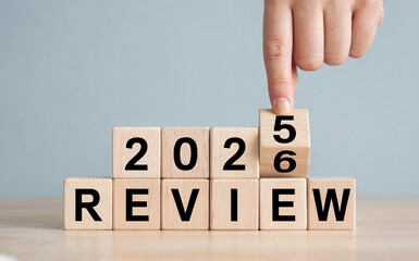Hand Flips Block for 2026 Year Review and Planning Concept