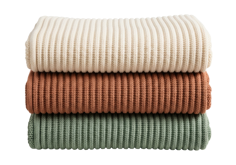 Stack of three folded knitted sweaters isolated PNG, cozy clothing in cream, brown and green colors on transparent background